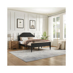 Black Queen platform bed displayed in an elegant bedroom