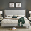 Queen Arles light gray wingback bed with two nightstands